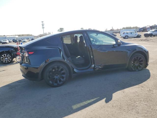 7SAYGAEE0PF608544  tesla model y 2022 IMG 2