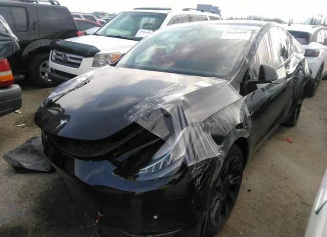 7SAYGAEE4NF488275  tesla model y 2022 IMG 1