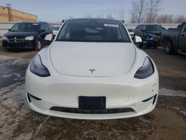 7SAYGAEE4NF545283  tesla model y 2022 IMG 4