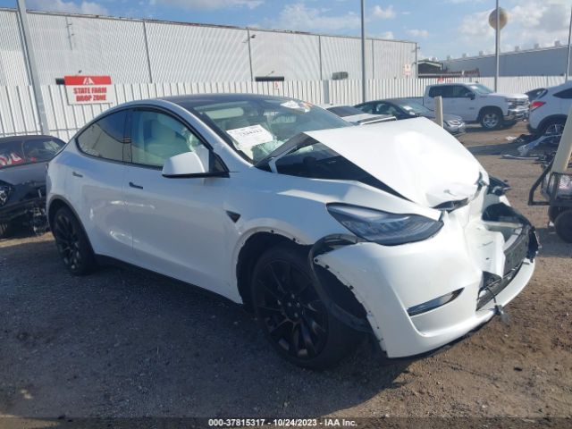 7SAYGAEEXNF427898  tesla model y 2022 IMG 0