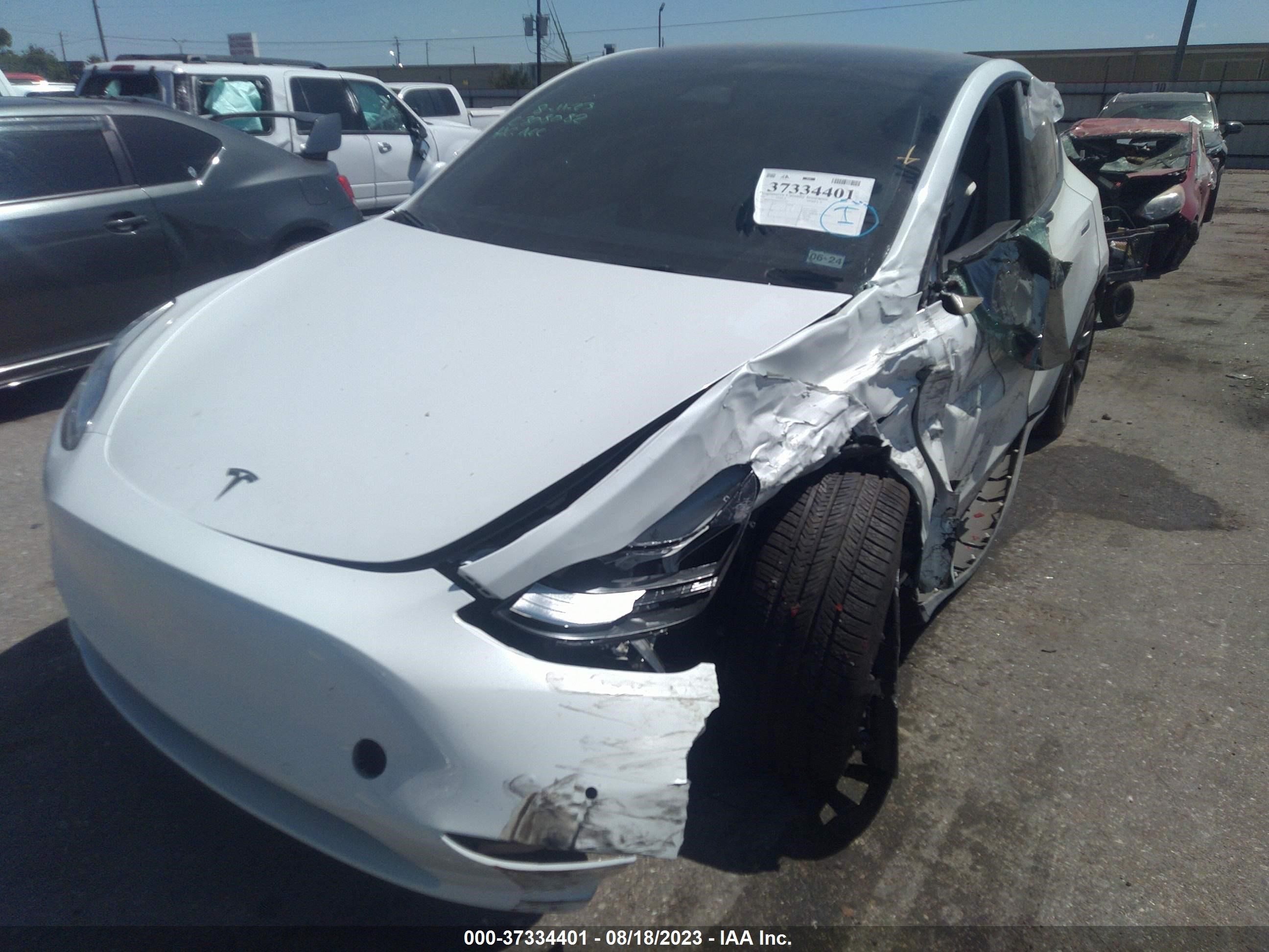 7SAYGDEE0NF427295  tesla model y 2022 IMG 1