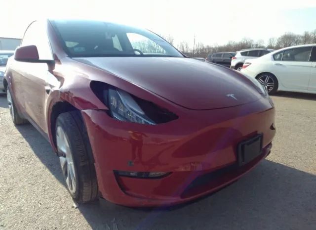 7SAYGDEE1NA019837  tesla model y 2022 IMG 5