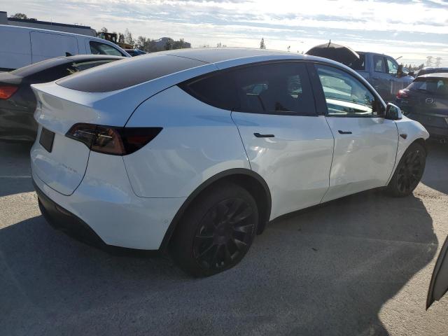 7SAYGDEE1NF387213  tesla model y 2022 IMG 2