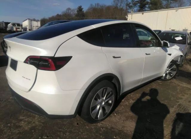 7SAYGDEE2NA012072  tesla model y 2022 IMG 3