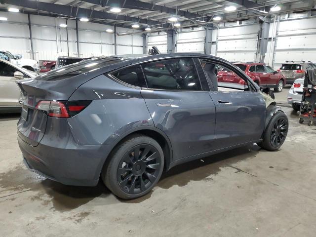 7SAYGDEE2NA013884  tesla model y 2022 IMG 2