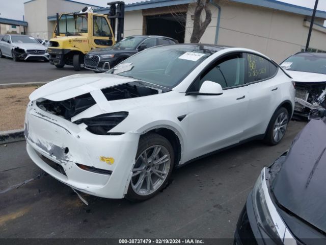 7SAYGDEE2NF360764  tesla model y 2022 IMG 1