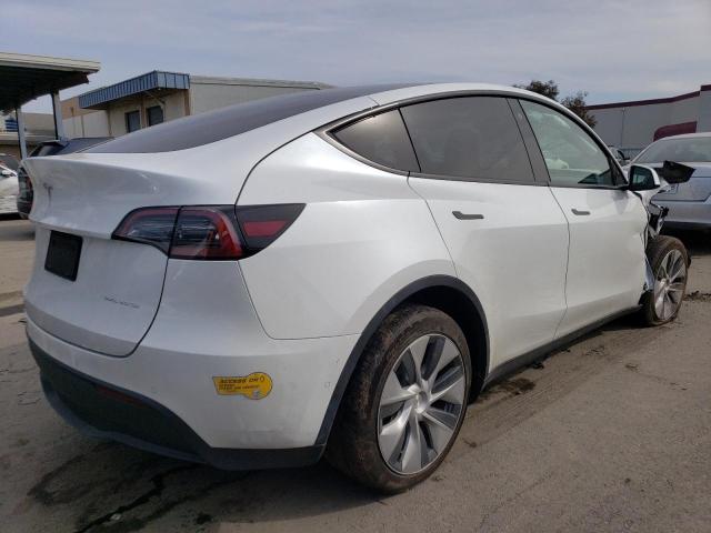 7SAYGDEE2NF424947  tesla model y 2022 IMG 2