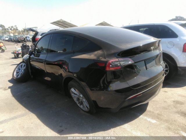 7SAYGDEE2NF447516  tesla model y 2022 IMG 2