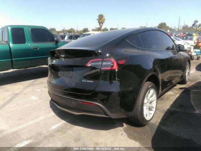 7SAYGDEE2NF447516  tesla model y 2022 IMG 3