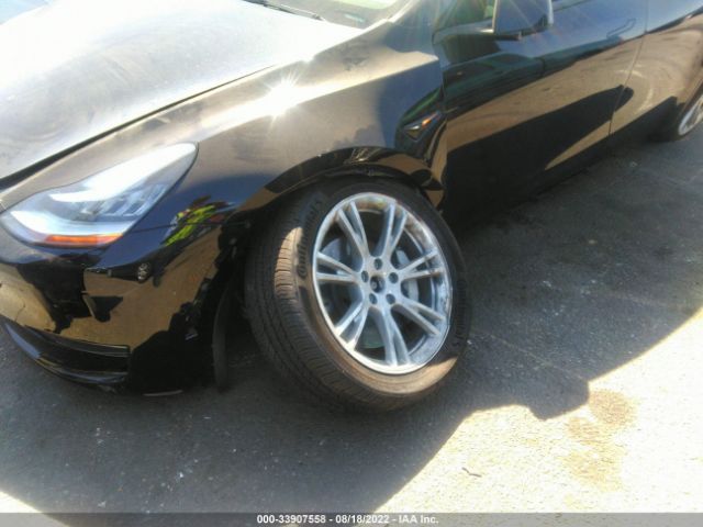 7SAYGDEE2NF447516  tesla model y 2022 IMG 5