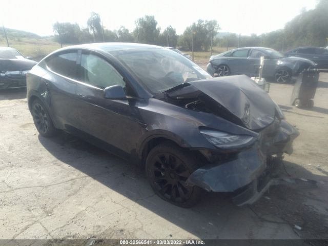 7SAYGDEE3NF364418  tesla model y 2022 IMG 0