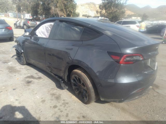 7SAYGDEE3NF364418  tesla model y 2022 IMG 2