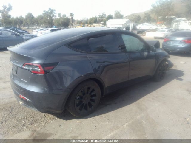 7SAYGDEE3NF364418  tesla model y 2022 IMG 3