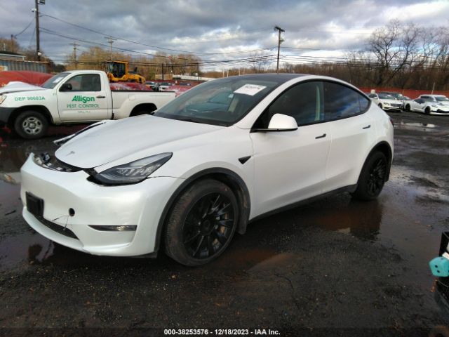 7SAYGDEE4NF401265  tesla model y 2022 IMG 1