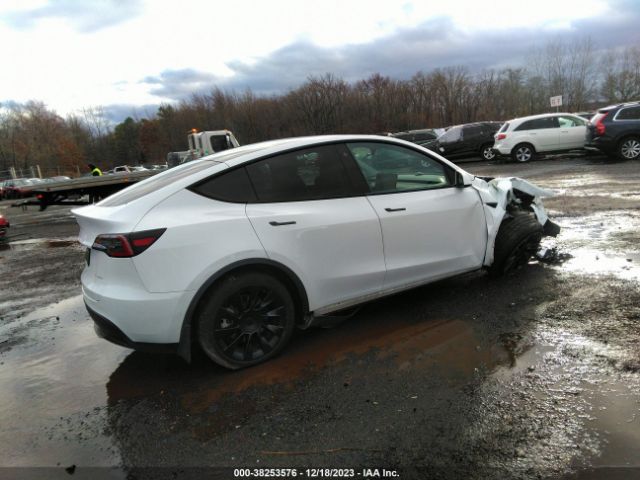 7SAYGDEE4NF401265  tesla model y 2022 IMG 3