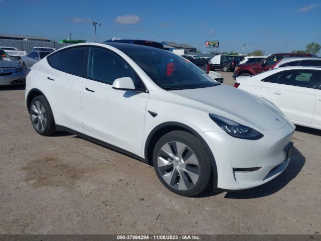 7SAYGDEE4NF448604  tesla model y 2022 IMG 0