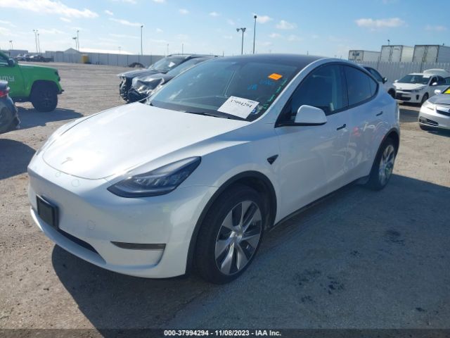 7SAYGDEE4NF448604  tesla model y 2022 IMG 1