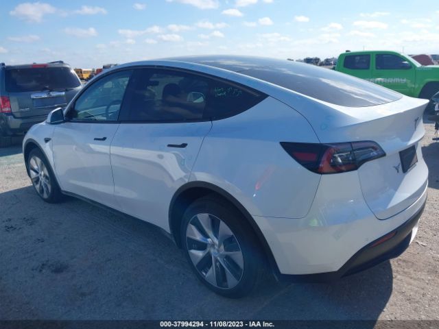 7SAYGDEE4NF448604  tesla model y 2022 IMG 2