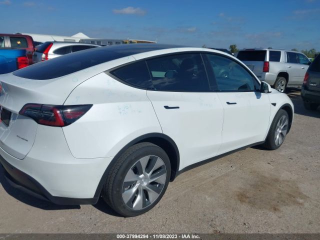 7SAYGDEE4NF448604  tesla model y 2022 IMG 3