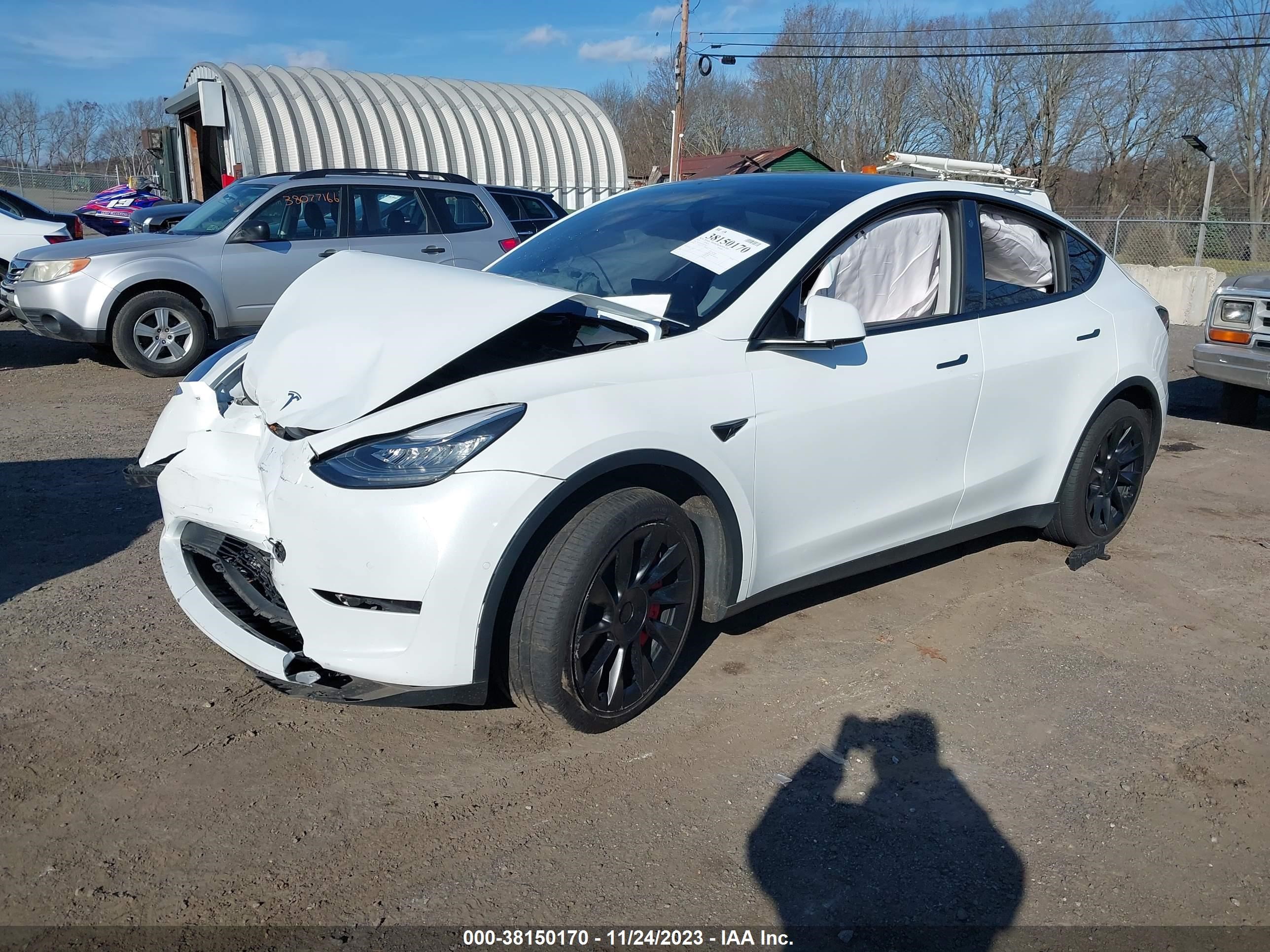 7SAYGDEE7NF339537  tesla model y 2022 IMG 1