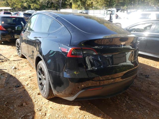 7SAYGDEE8NF425410  tesla model y 2022 IMG 2