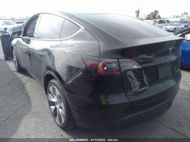 7SAYGDEE8PA032846  tesla model y 2023 IMG 2