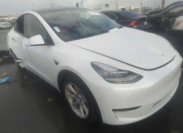 7SAYGDEE8PA038646  tesla model y 2023 IMG 0