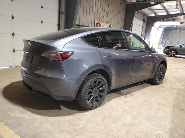 7SAYGDEE9NF458724  tesla model y 2022 IMG 2