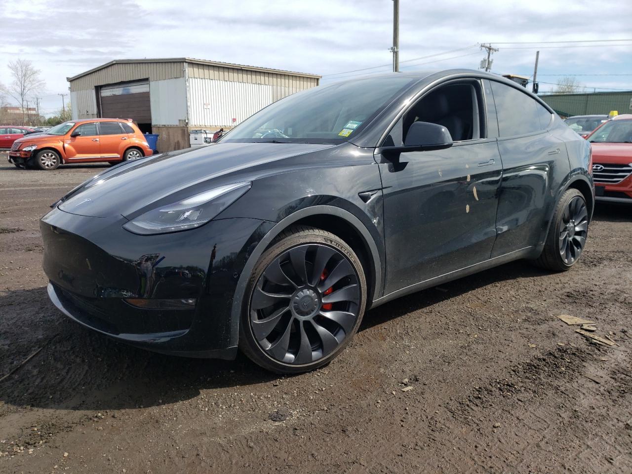 7SAYGDEF0NF452755  tesla model y 2022 IMG 0