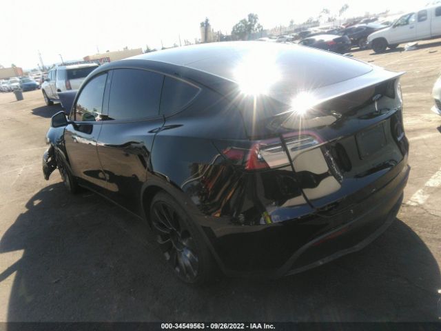 7SAYGDEF0NF491328  tesla model y 2022 IMG 2