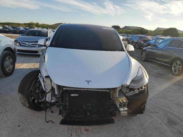 7SAYGDEF0NF534243  tesla model y 2022 IMG 4