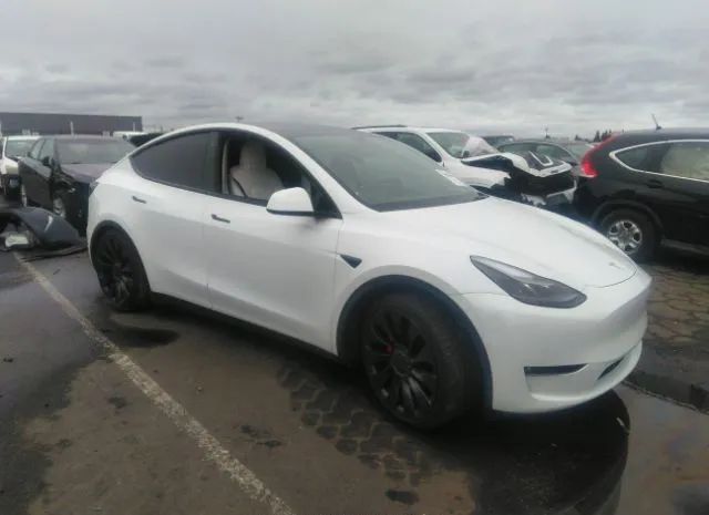 7SAYGDEF1NF389827  tesla model y 2022 IMG 0