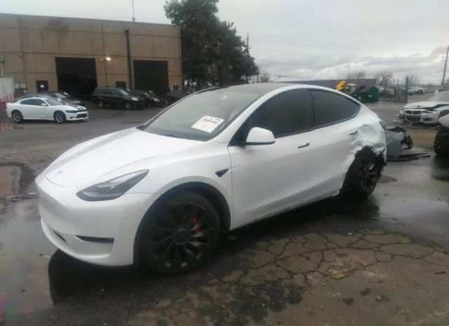 7SAYGDEF1NF389827  tesla model y 2022 IMG 1