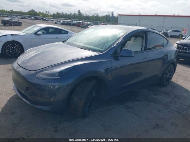 7SAYGDEF2NF523535  tesla model y 2022 IMG 1