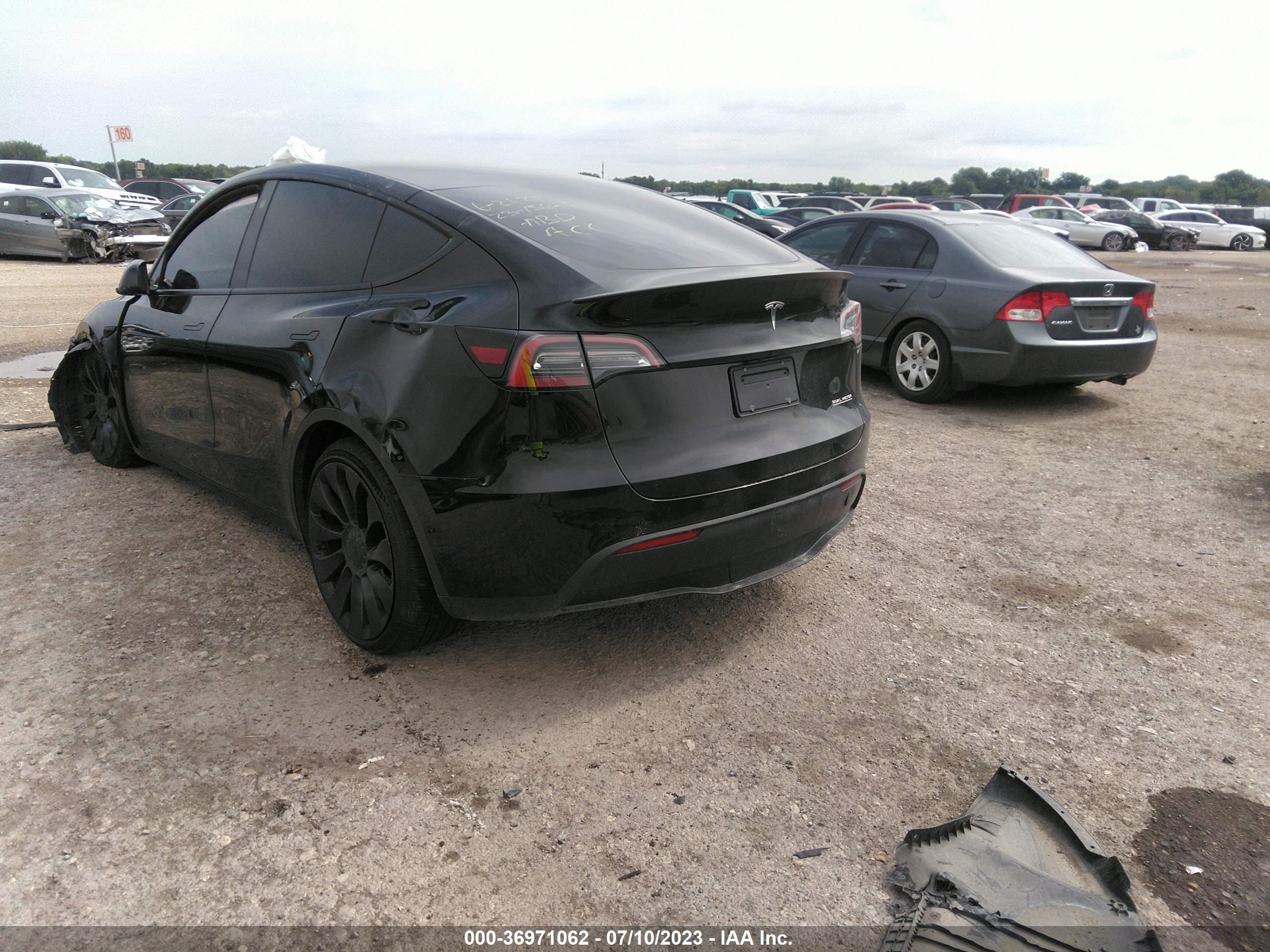 7SAYGDEF4NF502444  tesla model y 2022 IMG 2