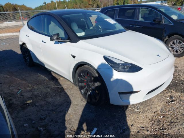 7SAYGDEF5NF381178  tesla model y 2022 IMG 0