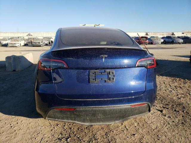 7SAYGDEF8NF451594  tesla model y 2022 IMG 5