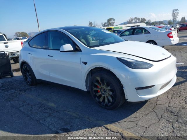 7SAYGDEF9NF537027  tesla model y 2022 IMG 0