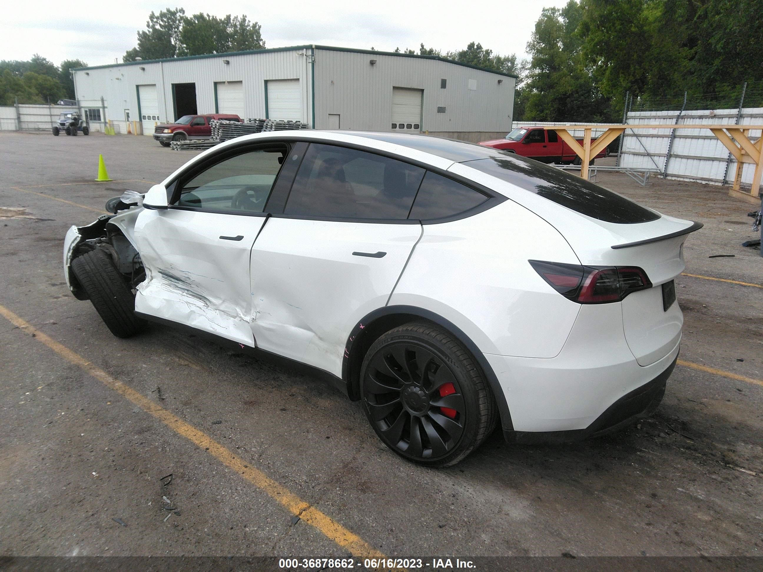 7SAYGDEF9NF543488  tesla model y 2022 IMG 2