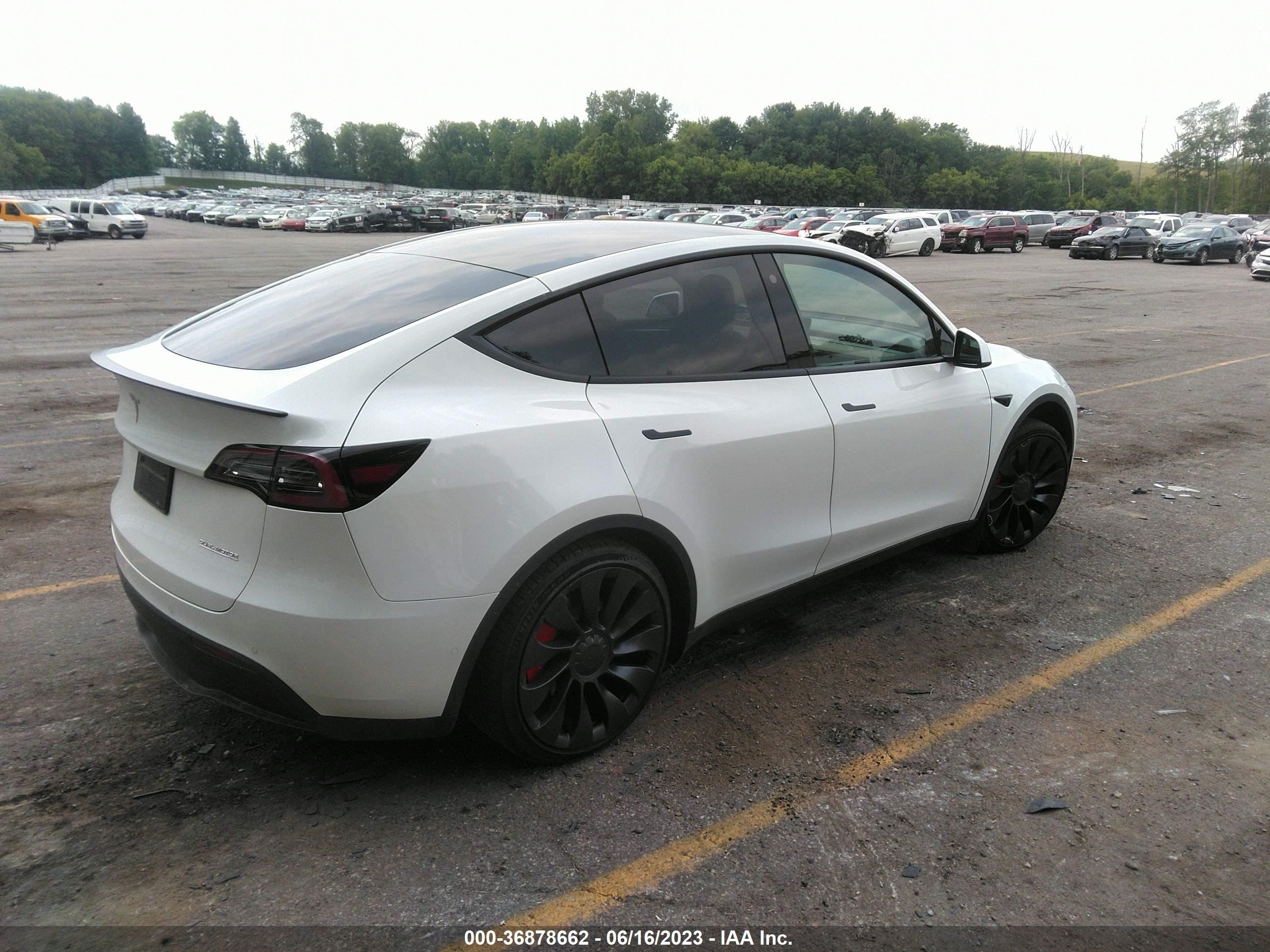 7SAYGDEF9NF543488  tesla model y 2022 IMG 3