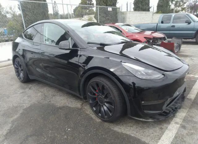 7SAYGDEF9NF544589  tesla model y 2022 IMG 0