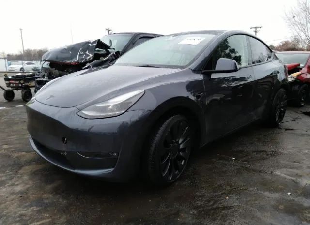 7SAYGDEFXNF452410  tesla model y 2022 IMG 1