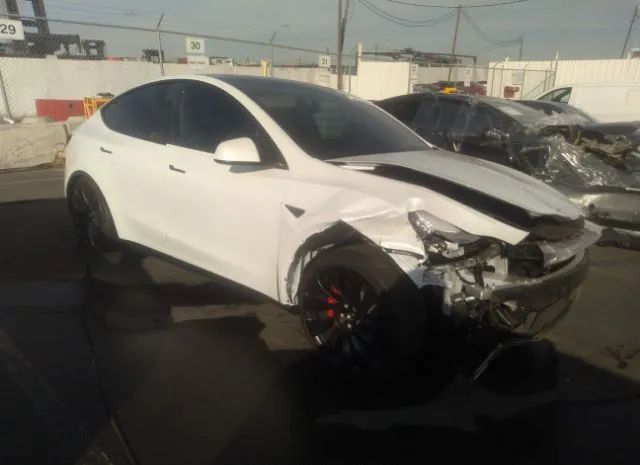 7SAYGDEFXNF558632  tesla model y 2022 IMG 0