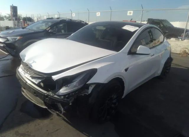 7SAYGDEFXNF558632  tesla model y 2022 IMG 1