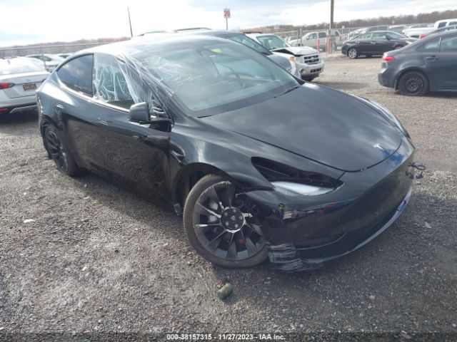 7SAYGAEE0PF863422  tesla model y 2023 IMG 0