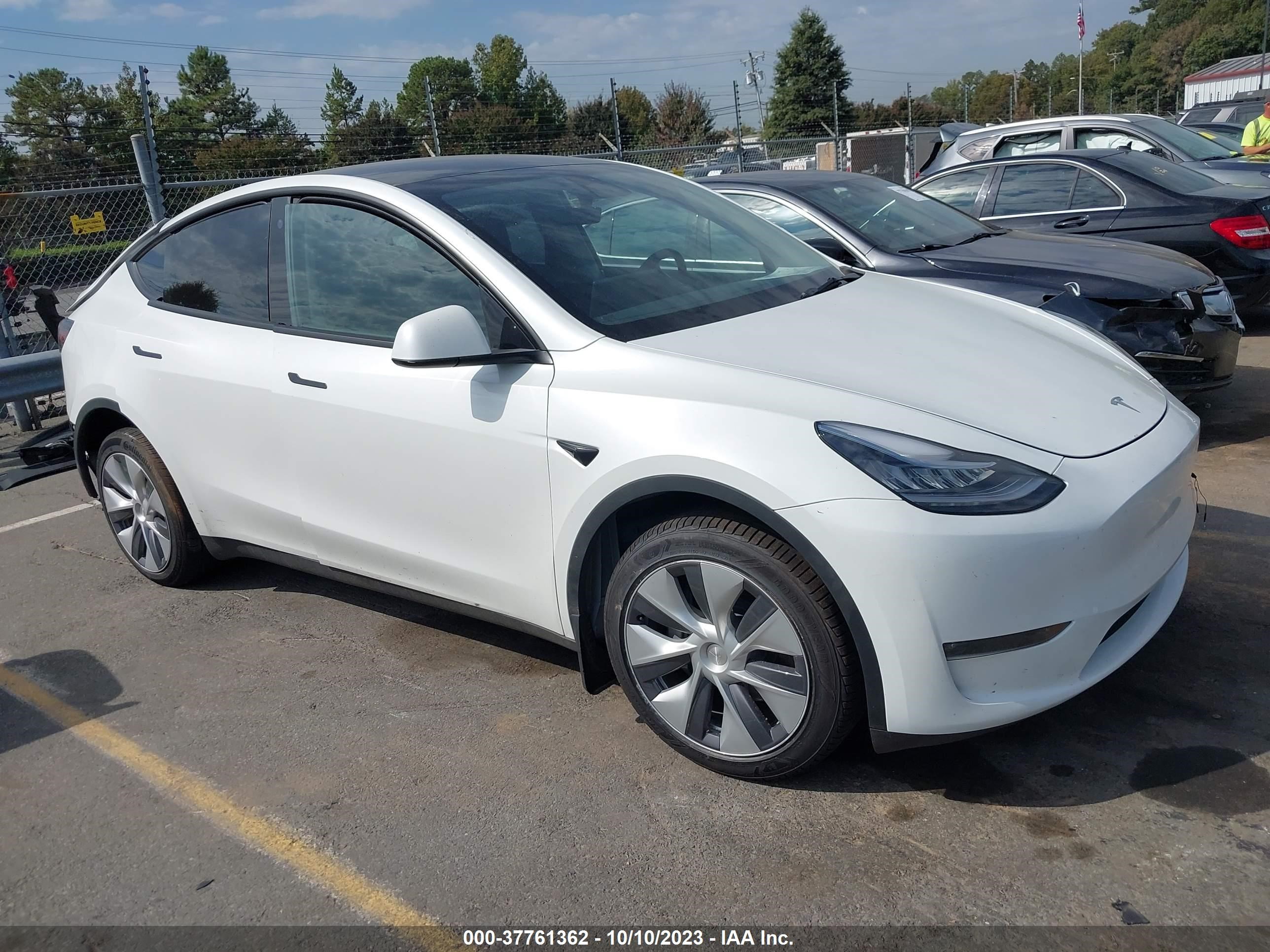 7SAYGDEE1PA061671  tesla model y 2023 IMG 0