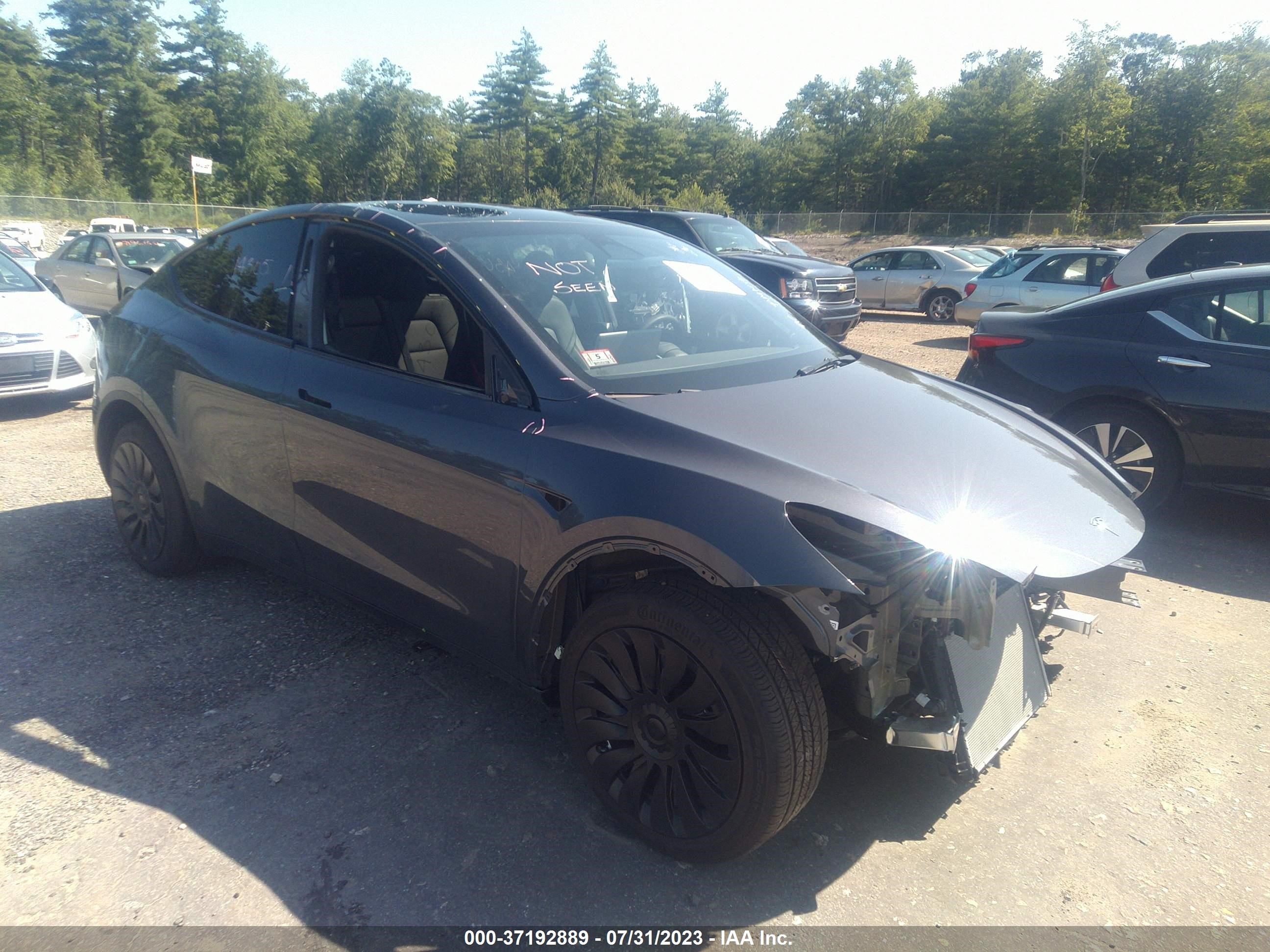 7SAYGDEE1PA100985  tesla model y 2023 IMG 0