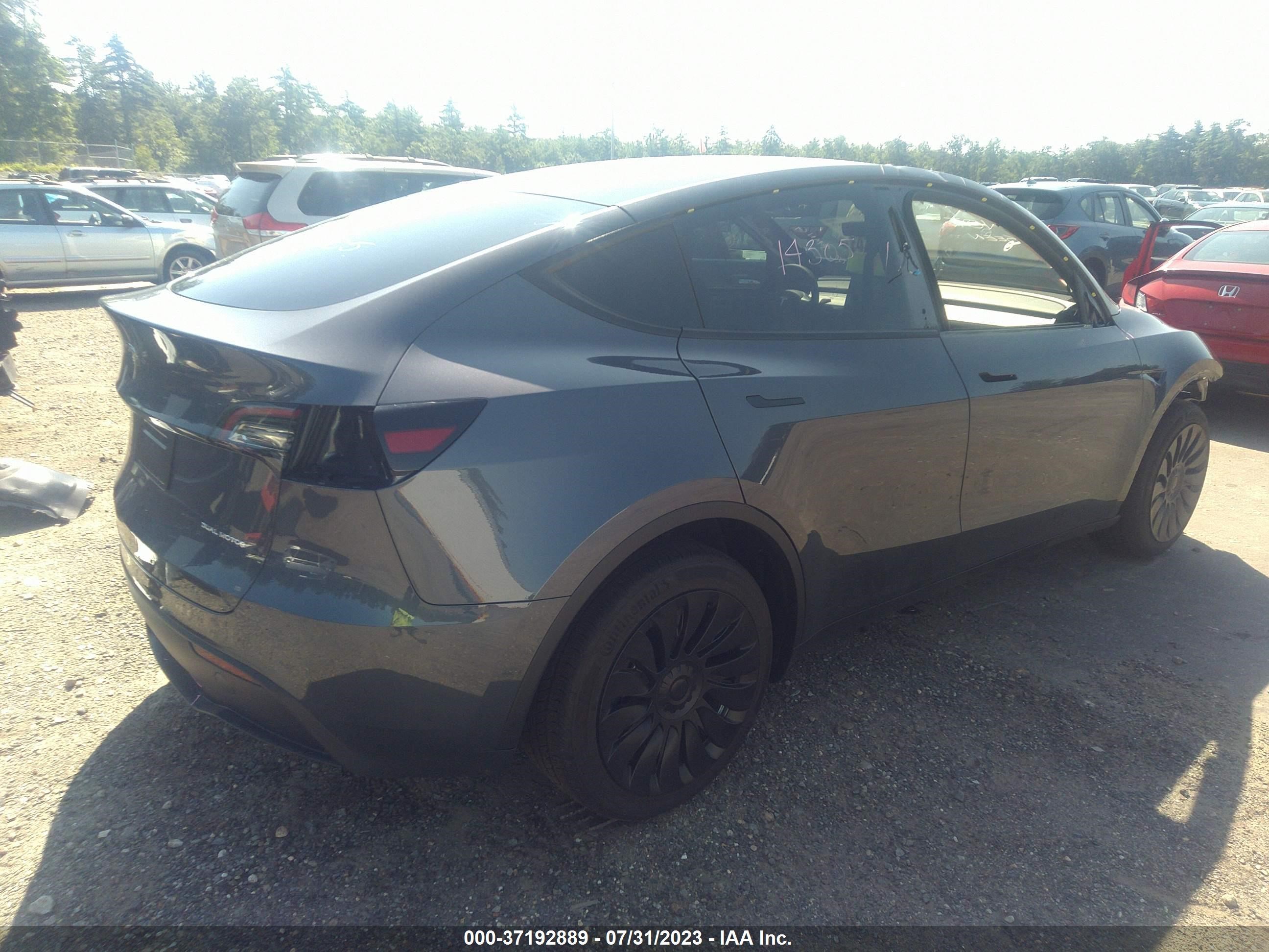 7SAYGDEE1PA100985  tesla model y 2023 IMG 3