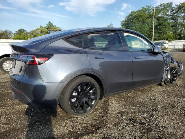 7SAYGDEE1PA104406  tesla model y 2023 IMG 2