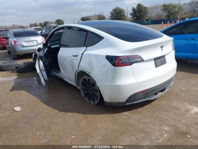 7SAYGDEE2PA083808  tesla model y 2023 IMG 2